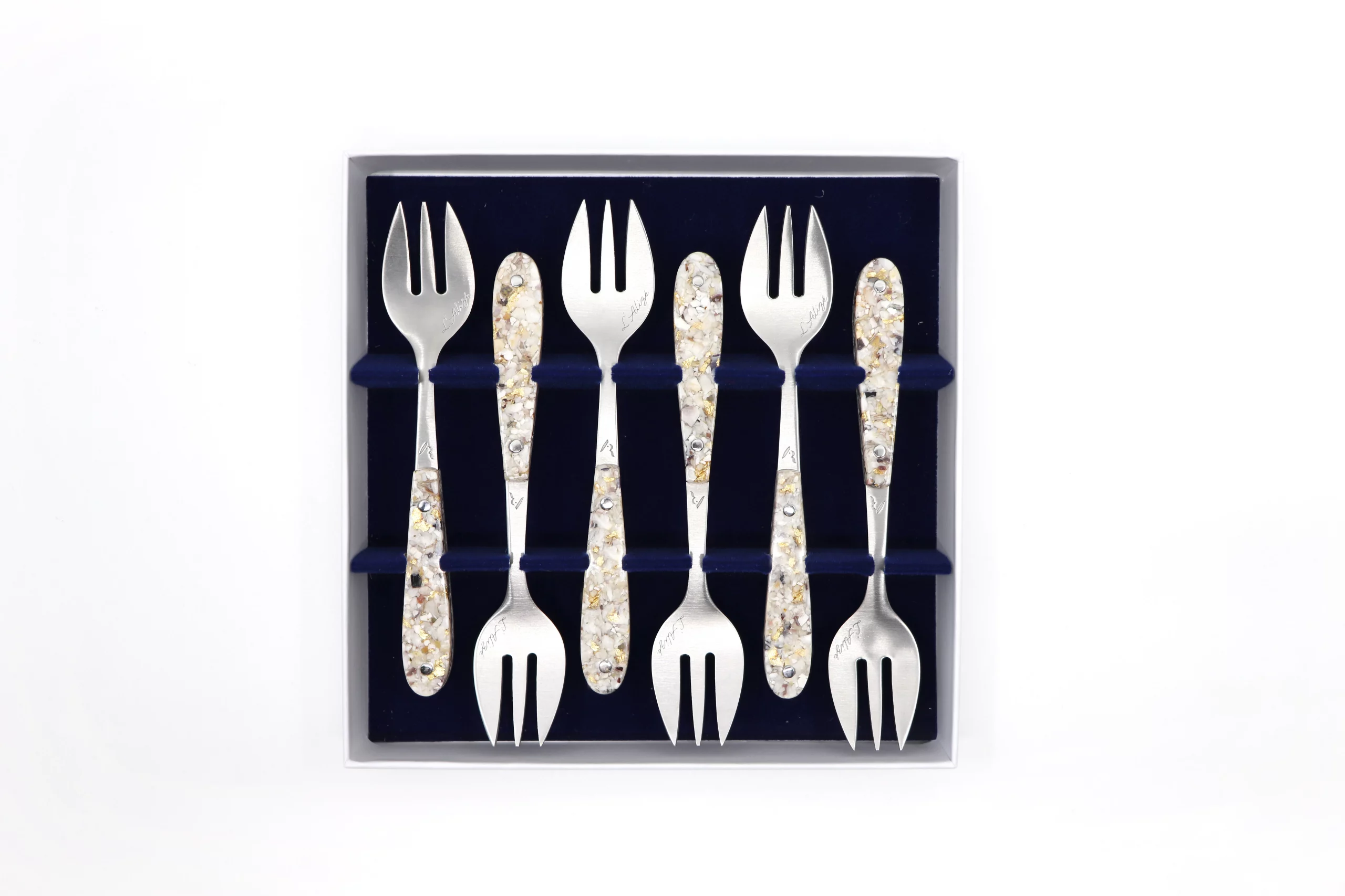 Coffret de 6 fourchettes l'alizé en coquilles d'huitres et or vue du dessus